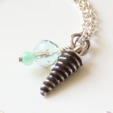Bead and sterling silver charm necklace
